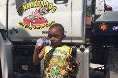 kid-next-to-tow-truck