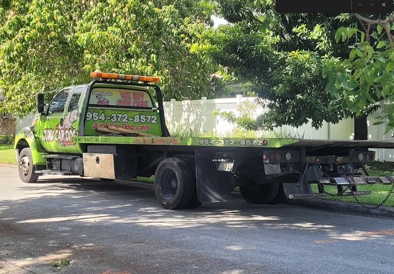 Tow Truck Preparing to Haul Junk Cars Miami 